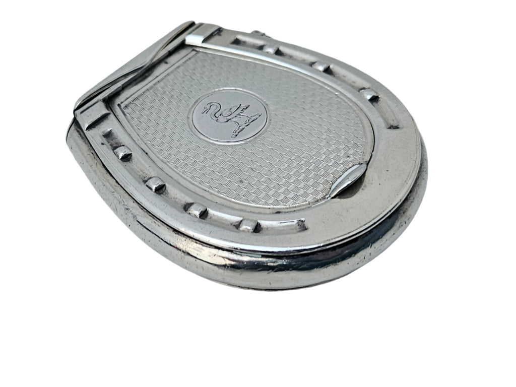 A STERLING SILVER 19TH CENTURY ANTIQUE FRENCH SNUFF BOX & VESTA MATCH CASE from SEVENTH PLATEAU, featuring a semi-circular design and a hinged lid, rests on a marble surface. Its top showcases a textured pattern with an engraved emblem at the center.