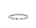 18K WHITE GOLD MULTI COLORED SAPPHIRE & SPINEL BEZEL SET TENNIS BRACELET